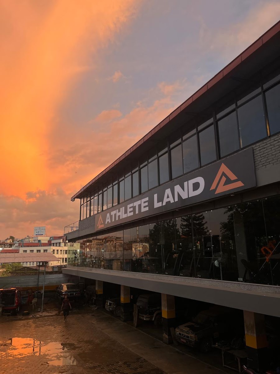 Athlete Land exterior at sunset